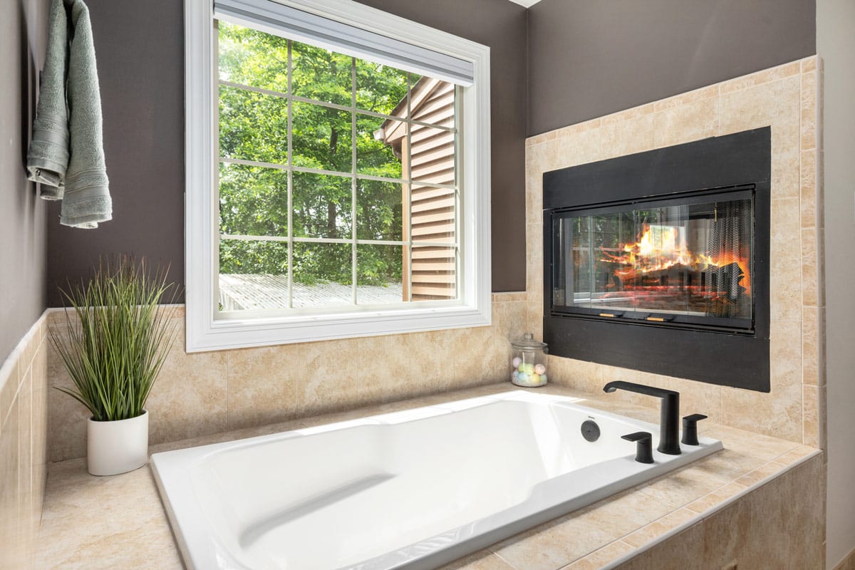 bathtub with fireplace