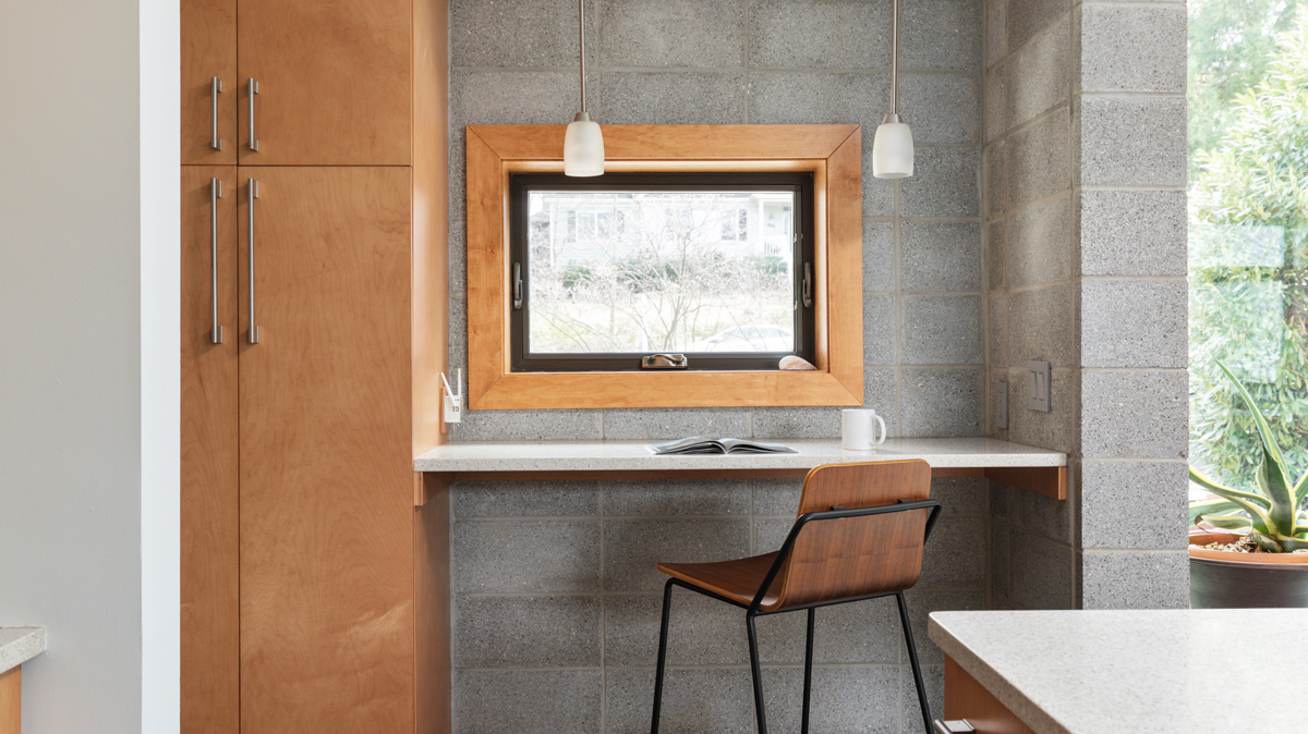 small desk nook with window overlooking the neighborhood