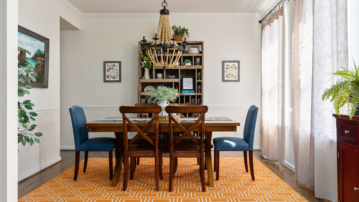 living room with orange and slate blue accents
