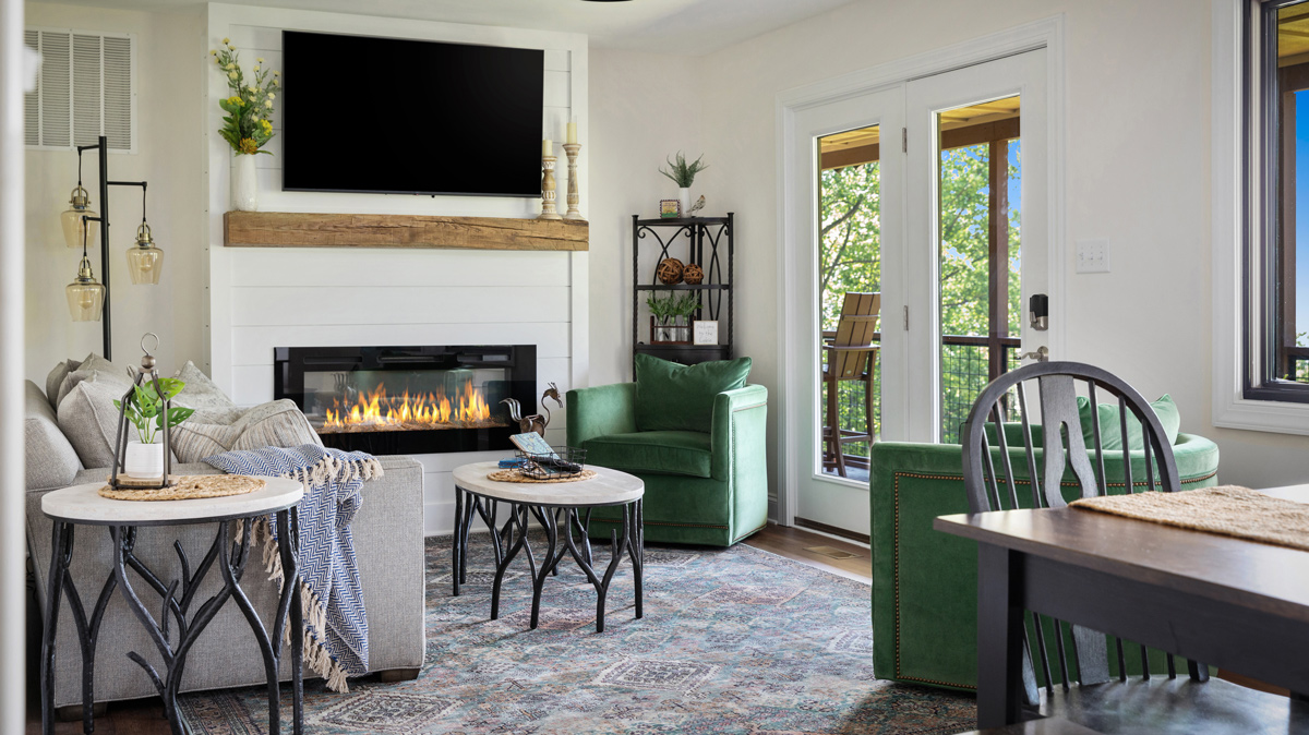 bright living room with green and brown accents