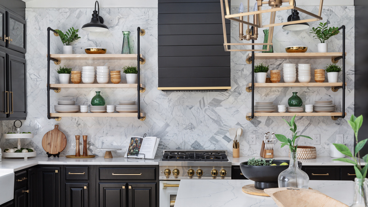 bright kitchen with black and white accents featuring a gas range and open shelving