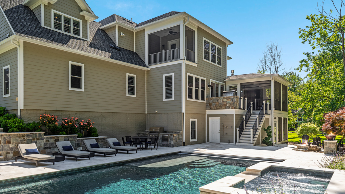 backyard with in-ground pool and hot tub plus additional seating areas
