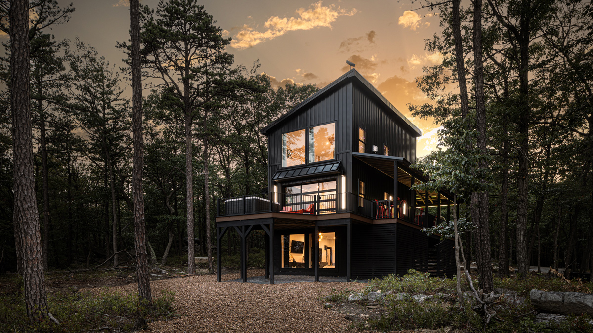 Modern home in the woods complete with patio and hot tub